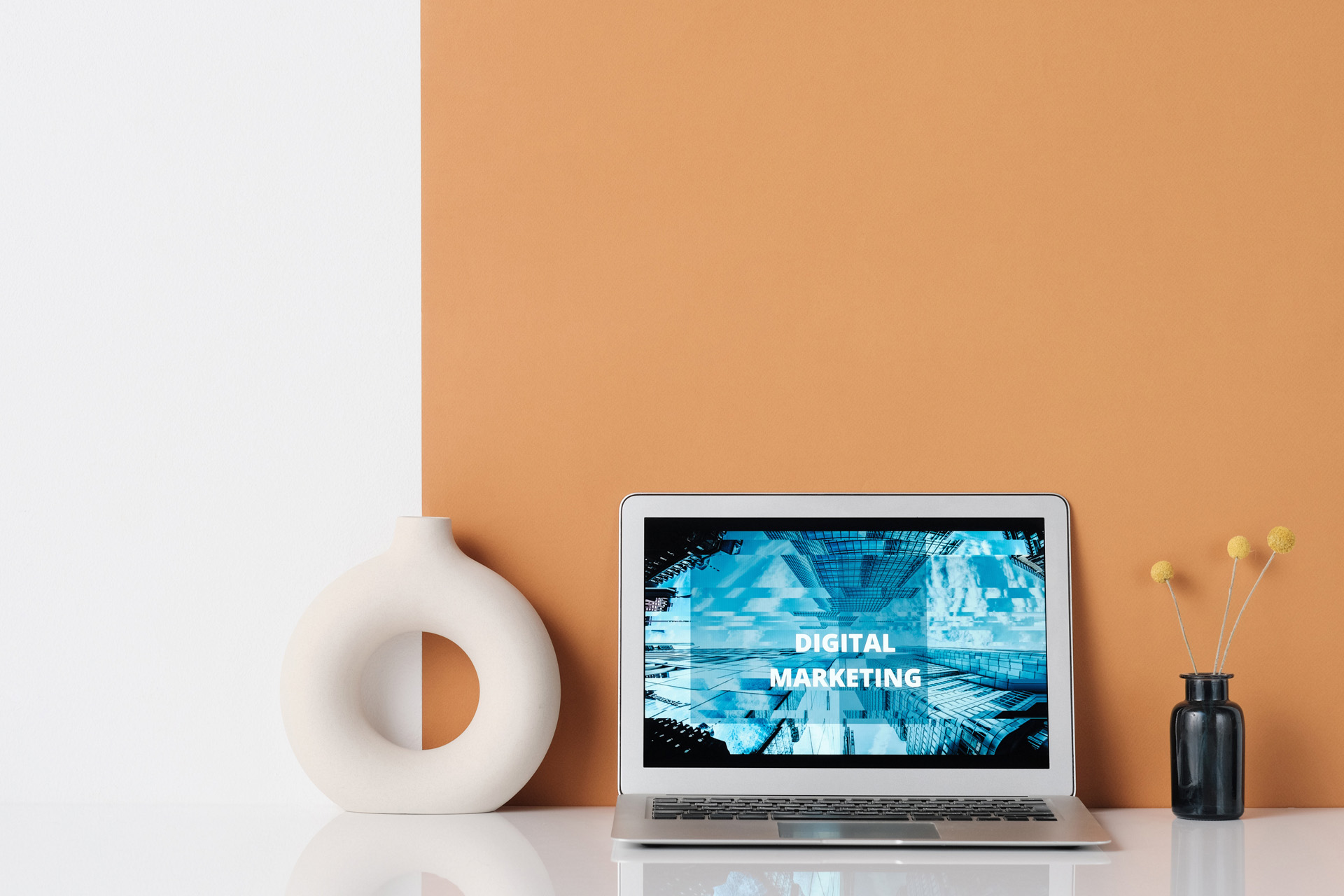 pink wall and laptop