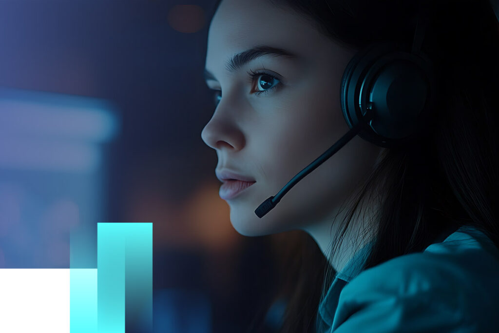 woman with headphones looking at web design screen