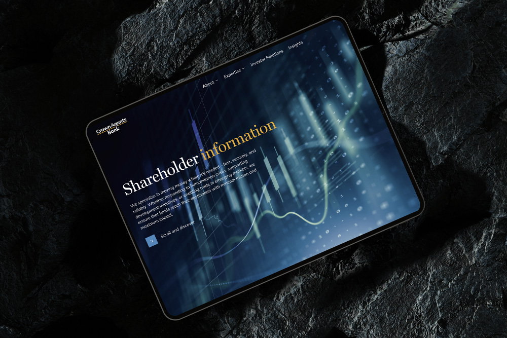 Financial web design within an ipad on rocks